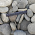 Kamenclub.ru: Галька речная плоская (серо-белая) фр. 70-120 мм. купить  в Луганске галька галечник речной серый, белый окатанная плоская  природная галька 9000 руб/т   фото КАМЕНЬ КЛУБ