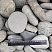 Kamenclub.ru: Галька речная окат (темно-серая) фр. 70-150 мм. купить  в Луганске галька речная темно-серая, синяя, серая речная галька округлая  8000 руб/т   фото КАМЕНЬ КЛУБ